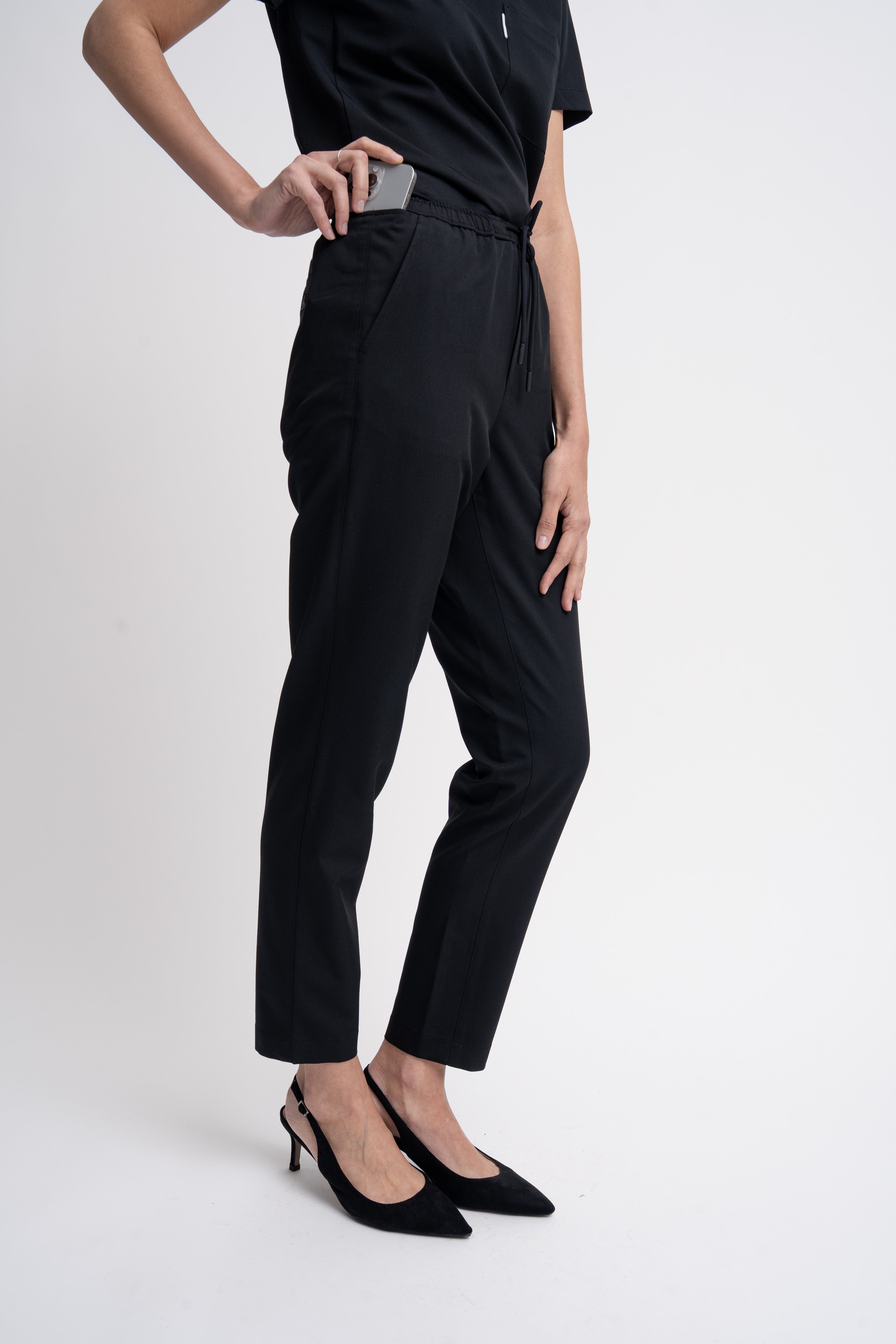 Close-up detail of the women's scrub pant in black.