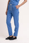 Women's scrub pant in Sailor Blue, front view, half body.