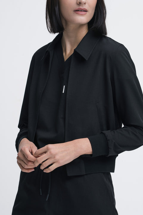 Chaqueta con abertura trasera de plumas