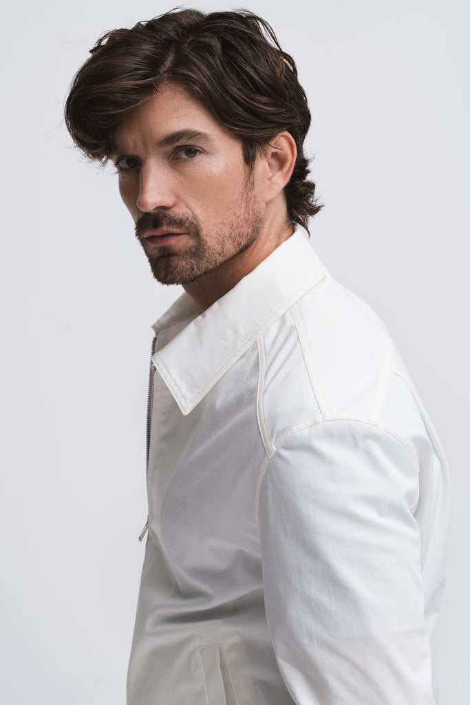 Close-up detail of lightweight men’s doctor jacket – cotton fabric and tailored stitching