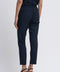 Women's scrub pant in navy, back view, half body.