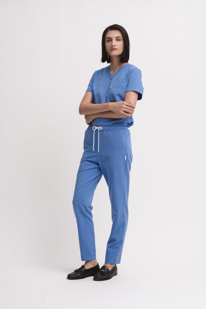 Women's scrub pant in Sailor Blue, full body view.