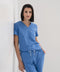 Women's V-neck scrub top in Sailor Blue, front view, half body.